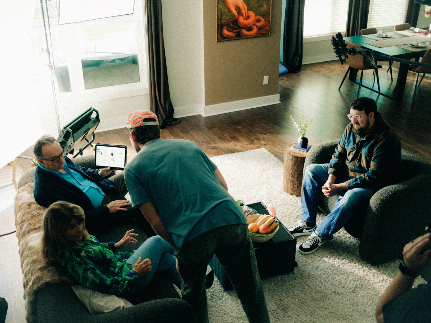 Reviewing the monitor with cast